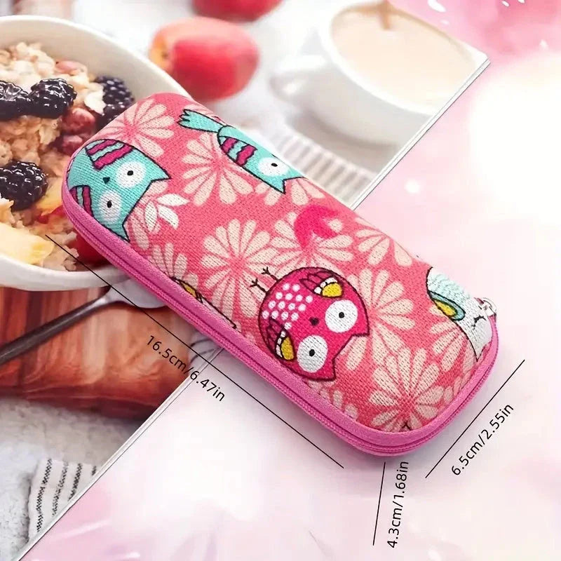 Cartoon-themed zippered eyeglass case in pink colour, featuring a playful and protective design for children's eyewear