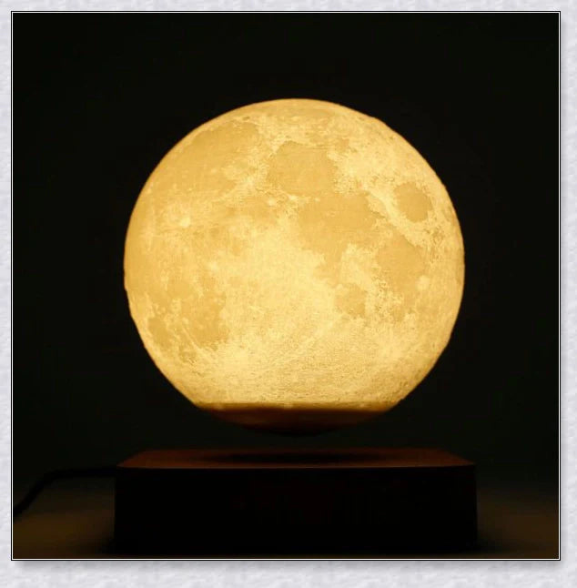 Lunamen Magnetic Levitating Moon Lamp with detailed lunar surface and floating above magnetic base