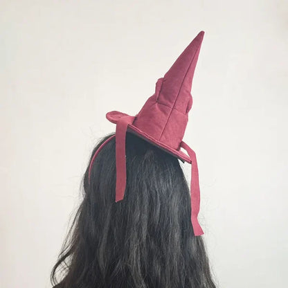 Sortband Halloween Witch Hat Headband in red, green, and brown colours with a detachable witch hat design