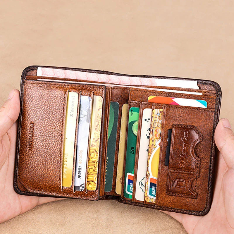 Premium men's short leather wallet with tri-fold design, made from top-grain cowhide leather for exceptional quality and style.