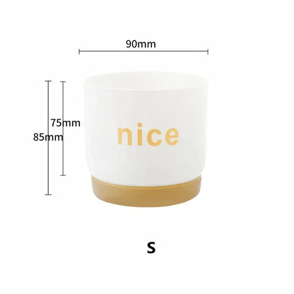 Stylish self-watering planters in various sizes for indoor plants, succulents, and flowers