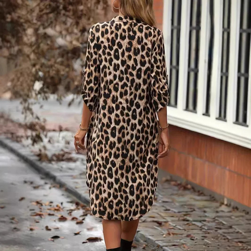 Elegant leopard print beach cover-up robe with V-neck and side pockets, perfect for summer vacations and beach parties.