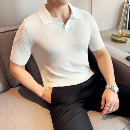 A premium cotton blend polo shirt in classic colours, featuring a v-neck lapel collar and slim fit design for a sophisticated casual look.