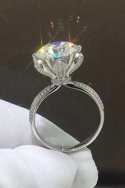 Exquisite 5-carat moissanite ring with zircon accents, crafted in 925 sterling silver with a sleek, modern design