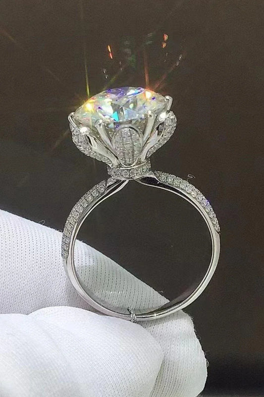 Exquisite 5-carat moissanite ring with zircon accents, crafted in 925 sterling silver with a sleek, modern design