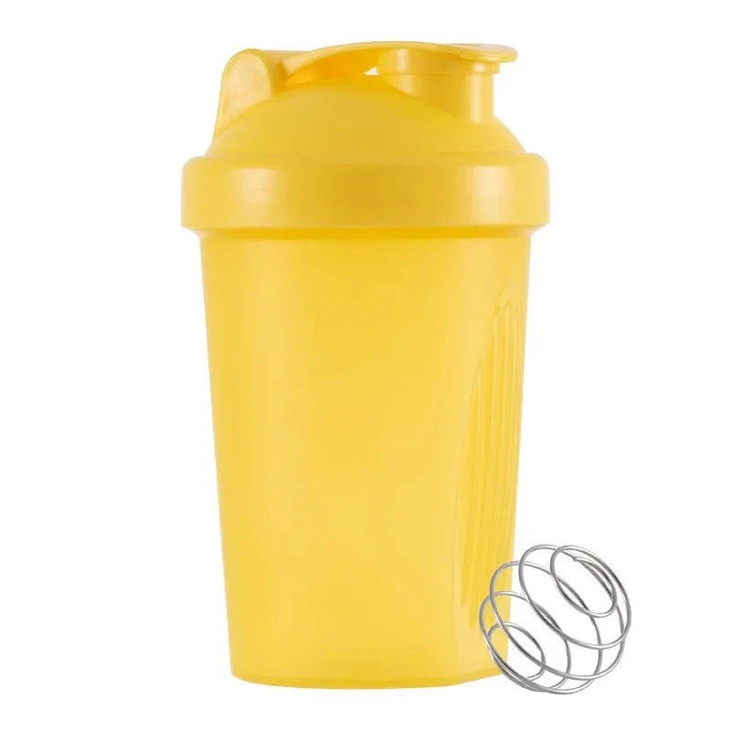 Premium protein shaker bottle with stainless steel whisk ball, BPA-free plastic, and leak-proof design for on-the-go fitness enthusiasts in the UK.