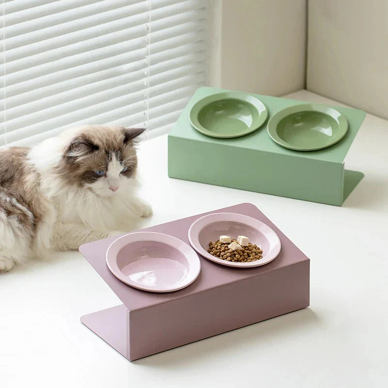 Stylish elevated ceramic pet bowls with an iron stand, designed for both cats and small dogs.