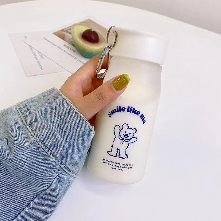 A frosted plastic water bottle with a cartoon dog design, perfect for everyday hydration and a fun, playful look.