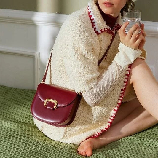 Premium high-end British wedding shoulder bag in brown, with a unique saddle shape design and hardwearing leather exterior