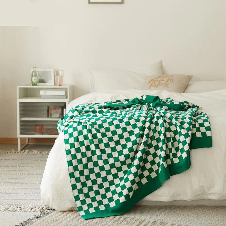 Cosy tartan check cotton knit throw blanket in earthy tones for stylish home decor