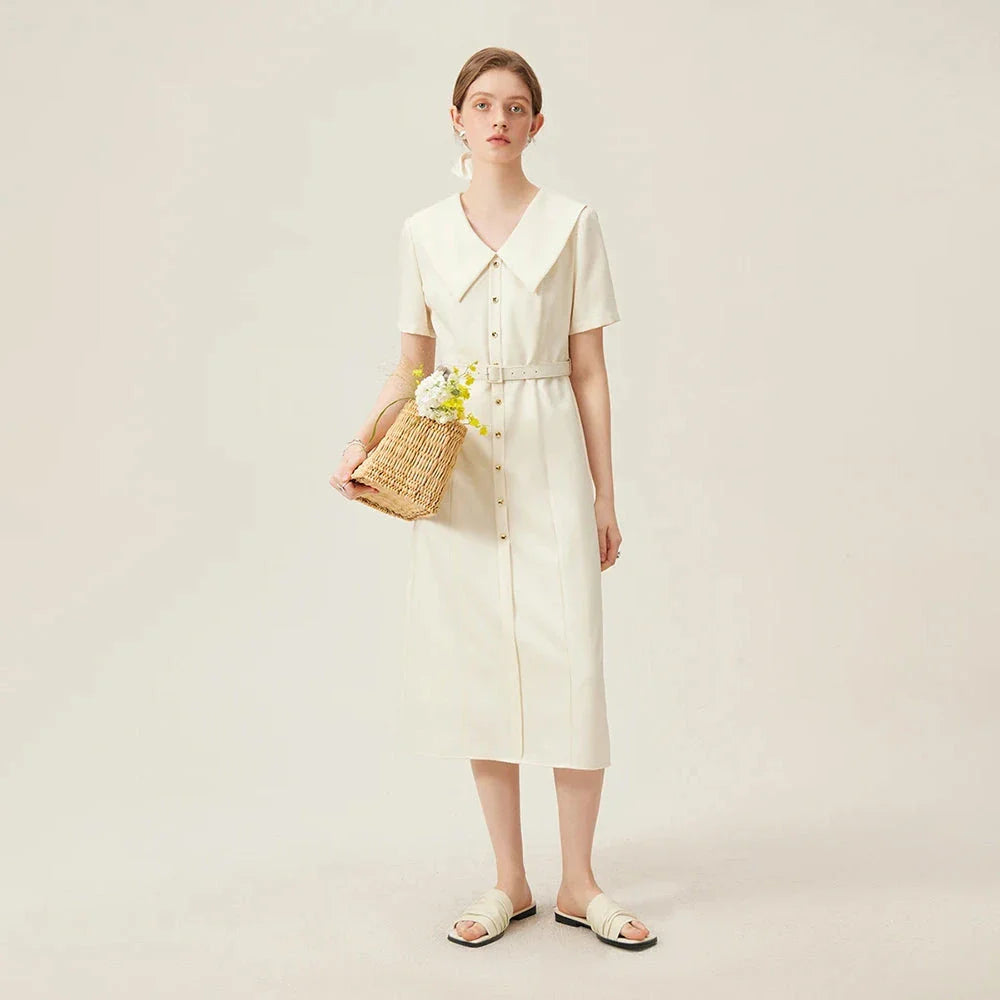 Elegant mid-calf summer dress in a sophisticated style, suitable for professional office wear and special occasions.