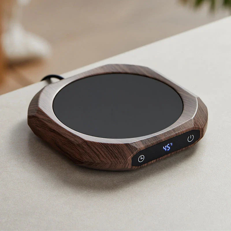 A black or wood grain-coloured thermal insulation heating pad with a sleek and modern design, providing consistent warmth and temperature control.