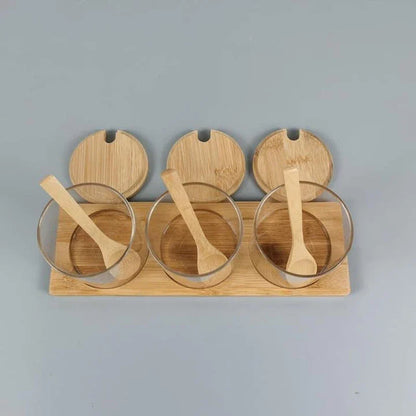 Premium glass and wood storage jars set with serving spoon, featuring airtight lids and minimalist design
