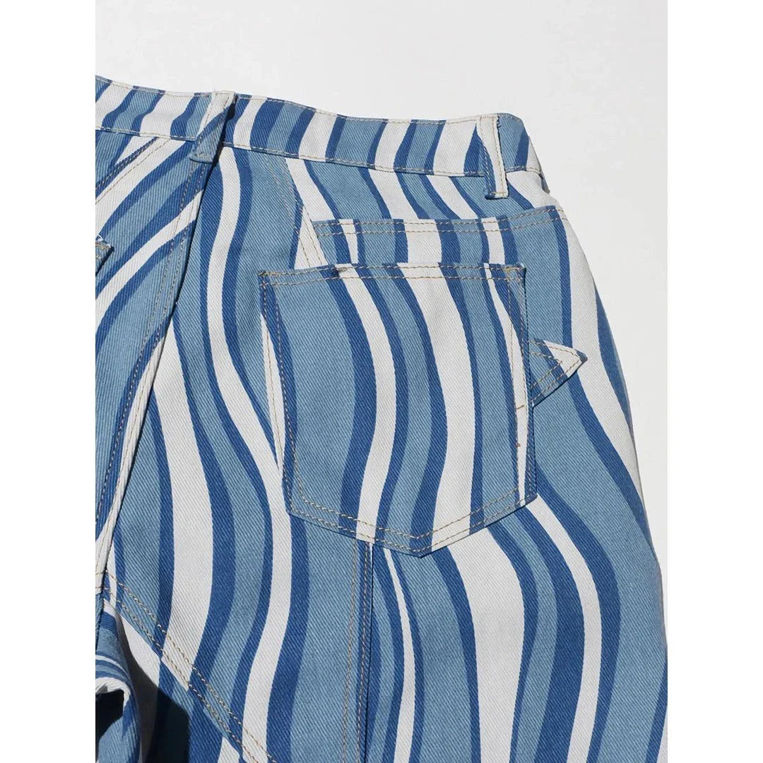 Women's high-waist striped denim trousers in a stylish blue colour, featuring a unique pattern and functional design for everyday wear.