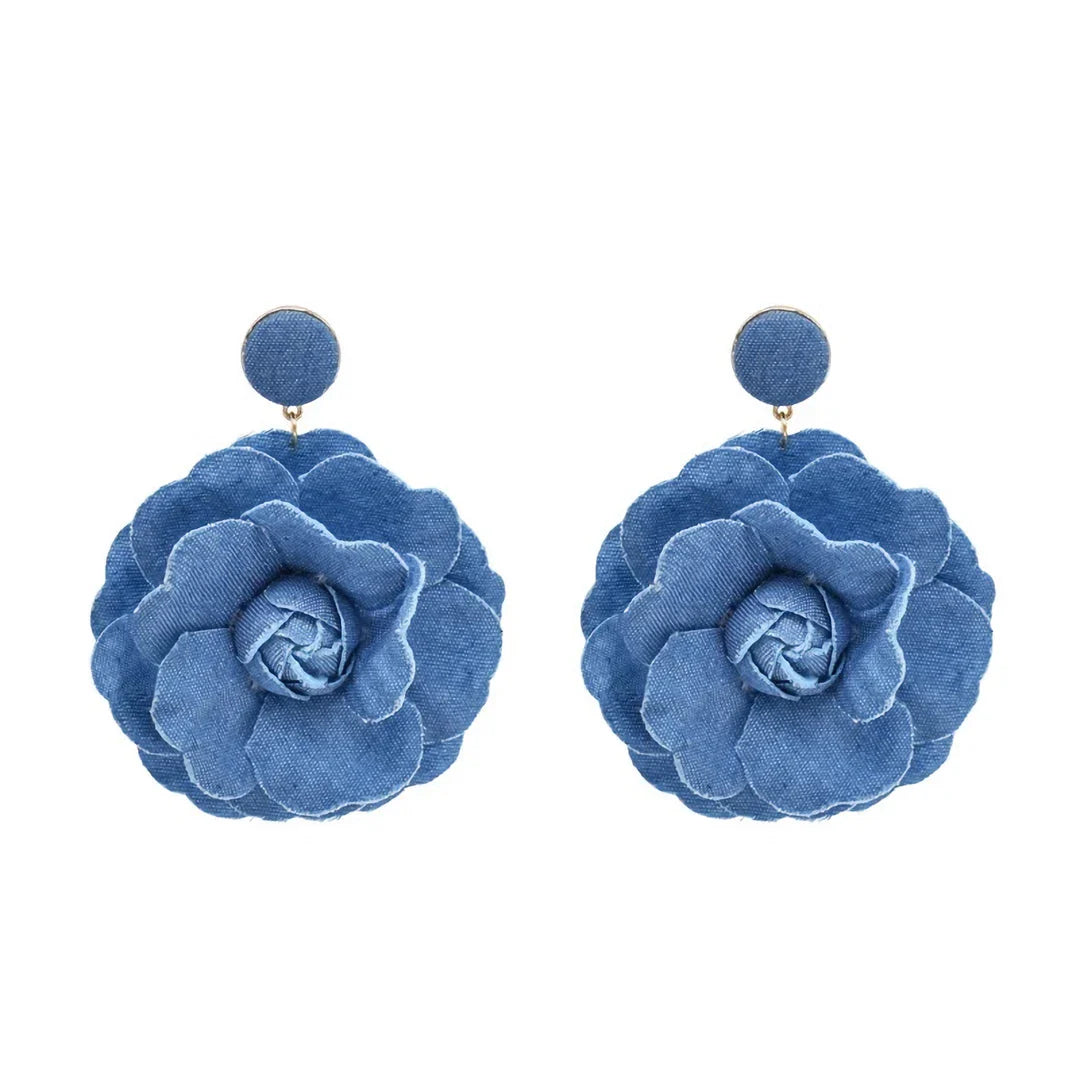 Exquisite denim drop earrings with charming accents, perfect for elevating British fashion and style
