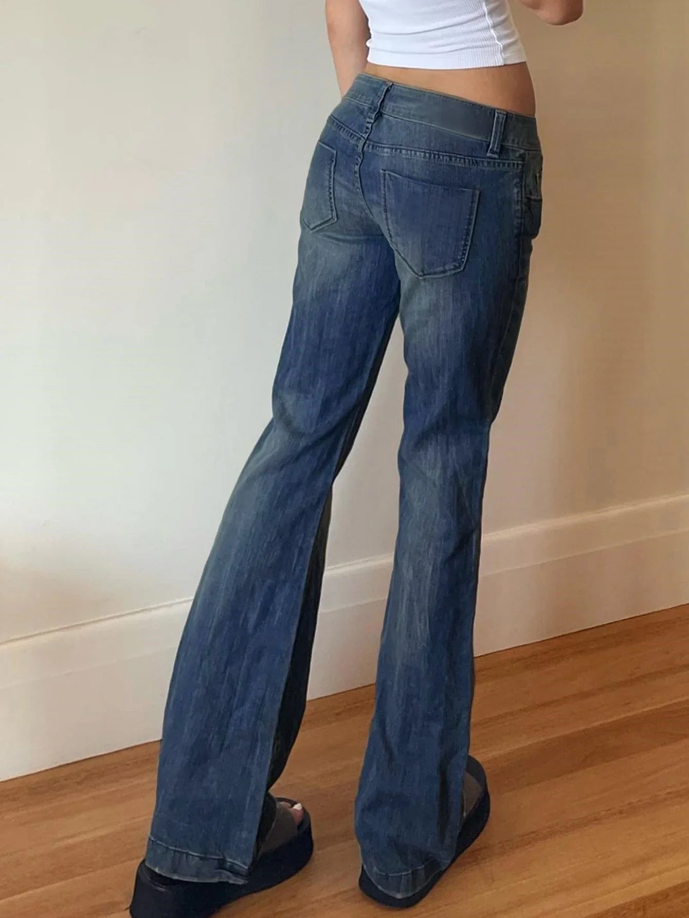 Premium British denim skinny jeans with a tailored fit, stretch fabric, and timeless blue wash