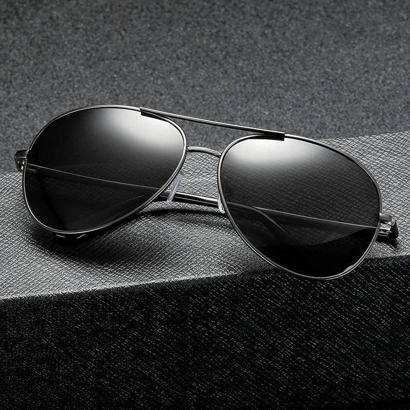 Photochromic Pilot Sunglasses with silver lenses that adjust tint based on light conditions