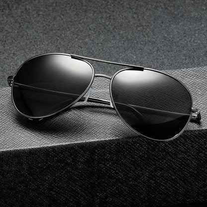 Photochromic Pilot Sunglasses with silver lenses that adjust tint based on light conditions