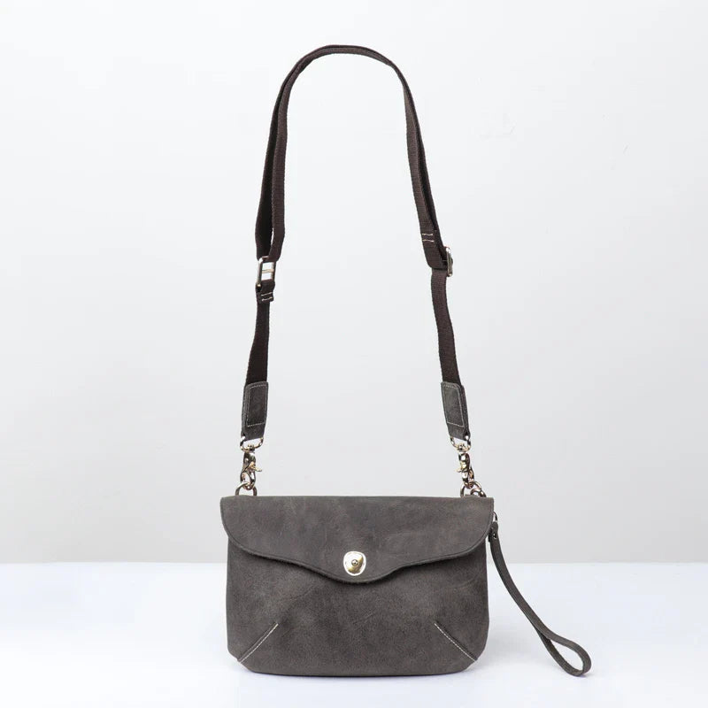 Premium handcrafted leather messenger bag in a classic British design, featuring a sturdy construction and spacious interior for the modern gentleman's everyday essentials.