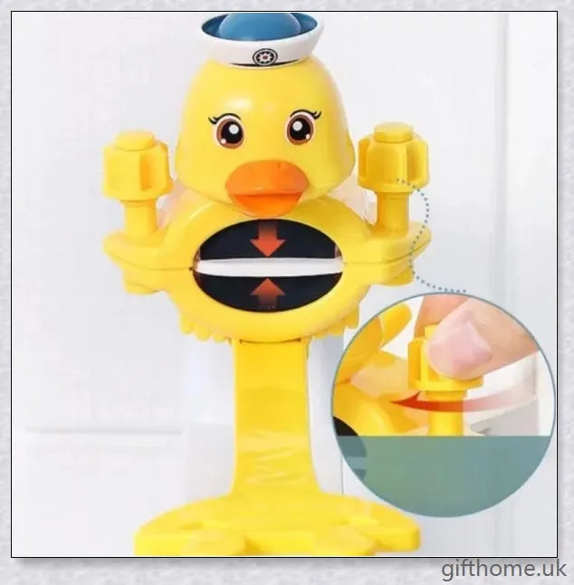 A yellow duck-shaped faucet extender that elevates a child's hand-washing experience at the sink