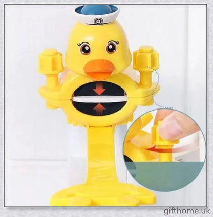 A yellow duck-shaped faucet extender that elevates a child's hand-washing experience at the sink