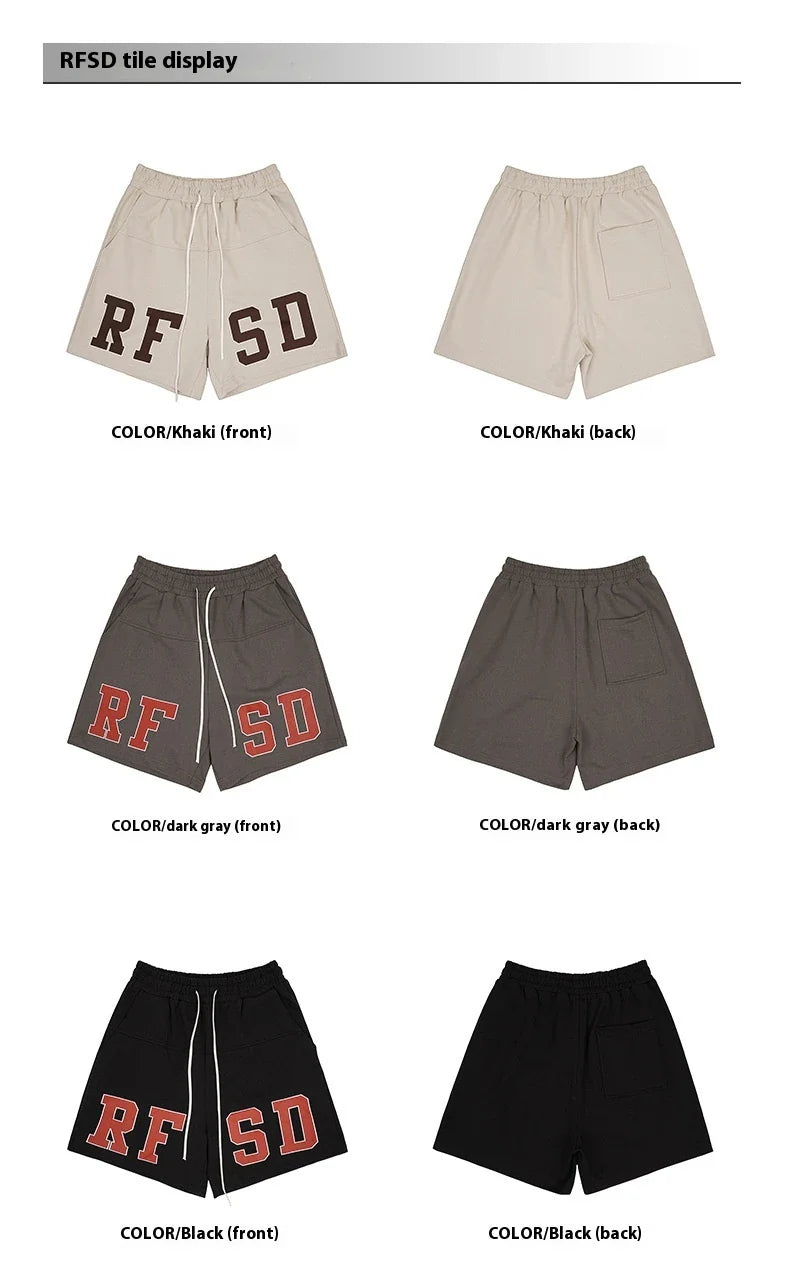 Premium loose-fit sports shorts with eye-catching printed patterns in black, khaki, and dark grey colours