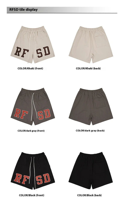 Premium loose-fit sports shorts with eye-catching printed patterns in black, khaki, and dark grey colours