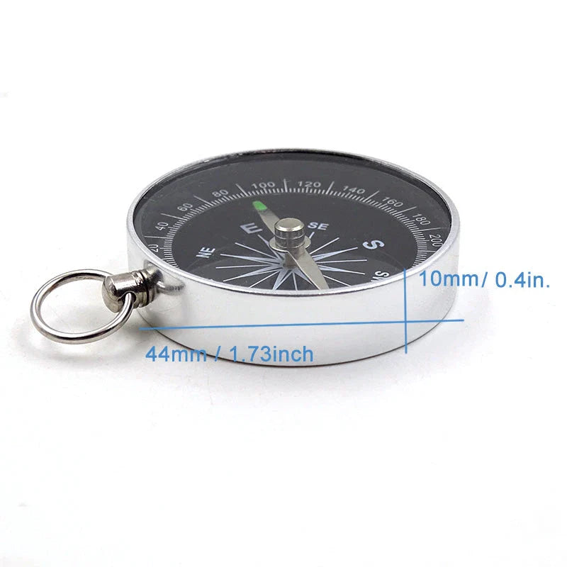 Compact aluminium compass keychain with tempered glass surface and bright compass face, perfect for outdoor adventures in the UK