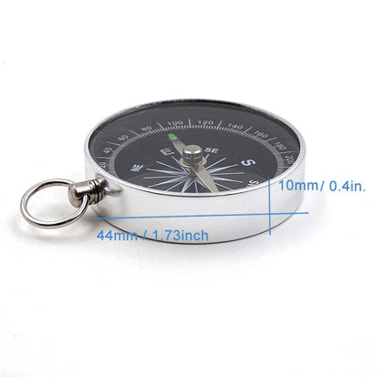 Compact aluminium compass keychain with tempered glass surface and bright compass face, perfect for outdoor adventures in the UK