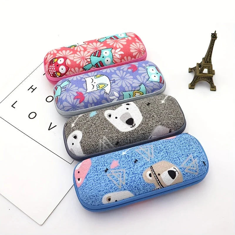 Cartoon-themed zippered eyeglass case in pink colour, featuring a playful and protective design for children's eyewear