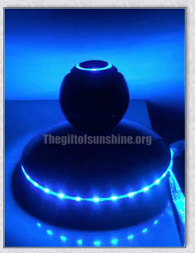 Levitating Bluetooth speaker with colourful lights, creating a mesmerising audio experience