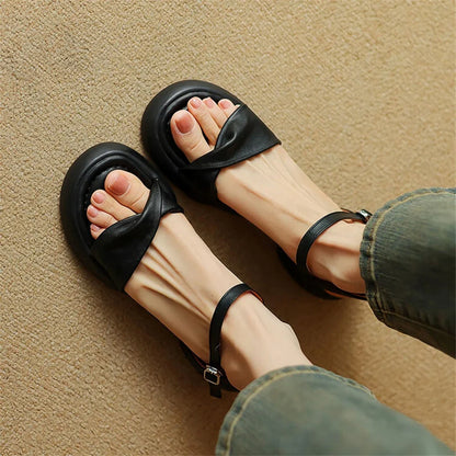 Premium leather chunky heel sandals in black with adjustable buckle strap for comfortable, stylish summer wear