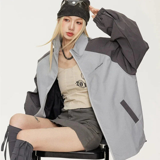 A stylish autumn-winter striped bomber jacket with lantern sleeves for women