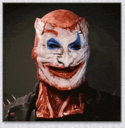 Terrifyingly lifelike horror mask with two removable layers, articulated jaw, and breathable design for a comfortable Halloween costume