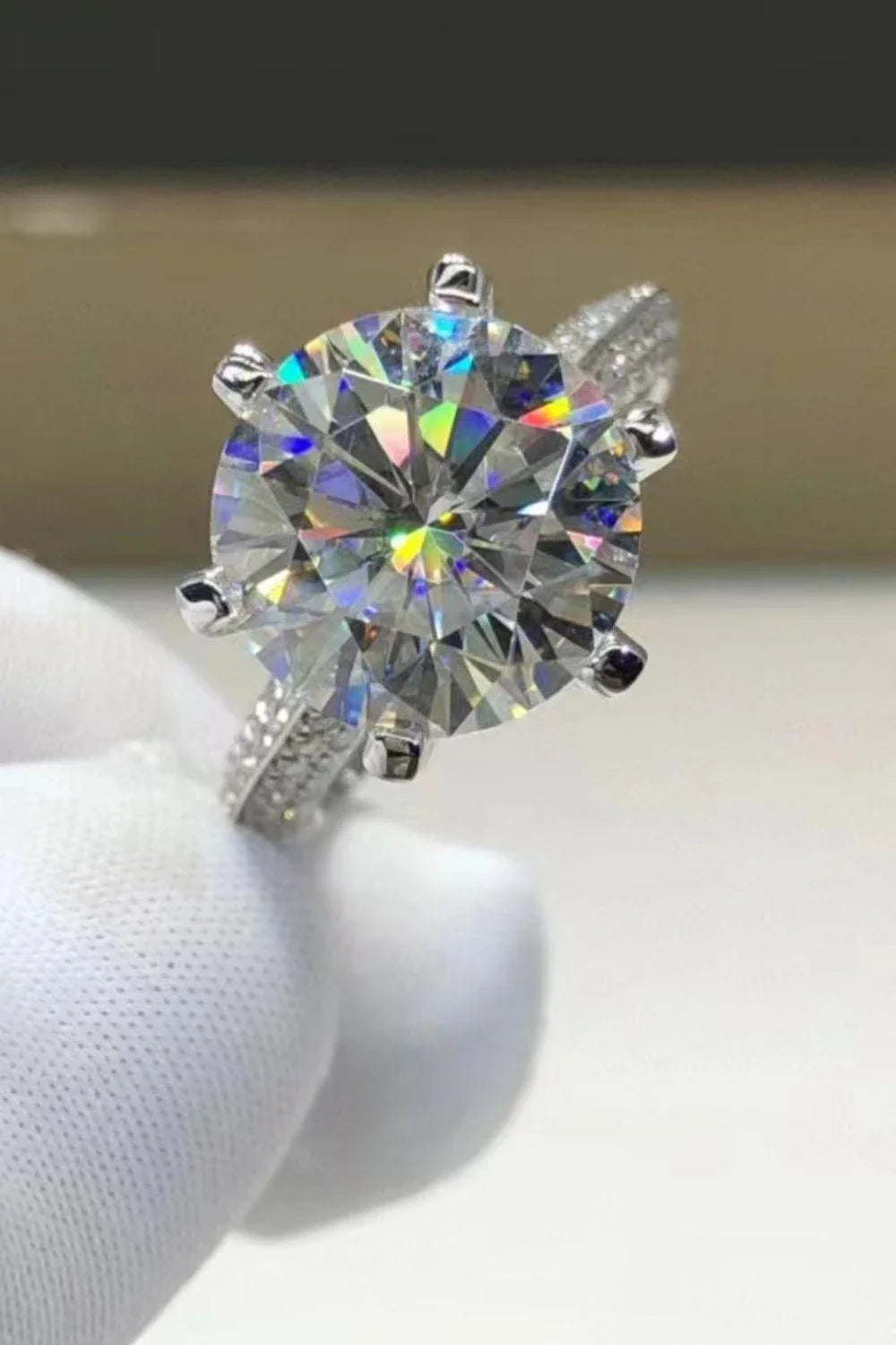 Elegant 5 carat moissanite solitaire ring in 925 sterling silver with platinum plating and sparkling zircon accents