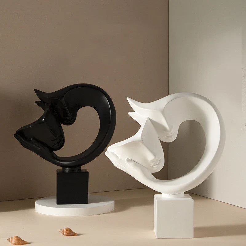 Elegant minimalist resin bogu wall shelf in white and black colours, with decorative items displayed on the shelf