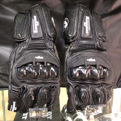 Premium motorcycle gloves made of leather and reinforced with carbon fibre for enhanced protection and breathability
