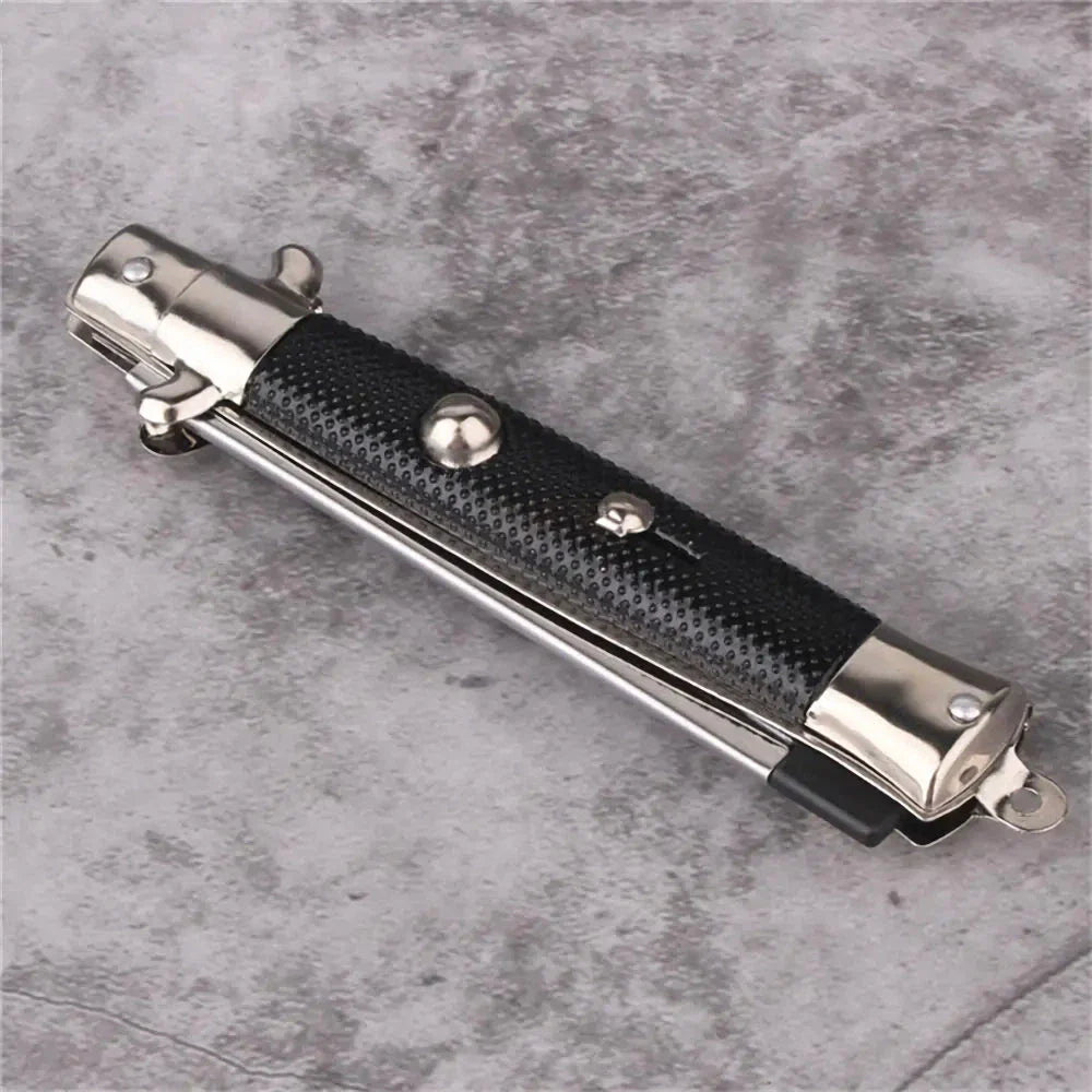 Butterfly Knife Style Folding Comb - A stylish and functional metal comb with a folding design inspired by the butterfly knife