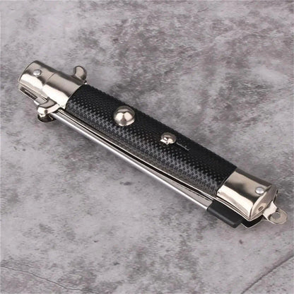 Butterfly Knife Style Folding Comb - A stylish and functional metal comb with a folding design inspired by the butterfly knife