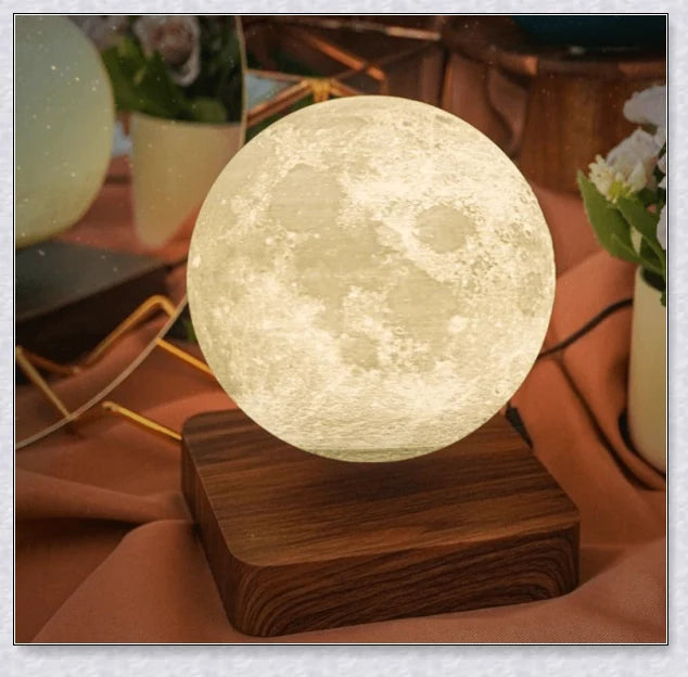 Lunamen Magnetic Levitating Moon Lamp with detailed lunar surface and floating above magnetic base