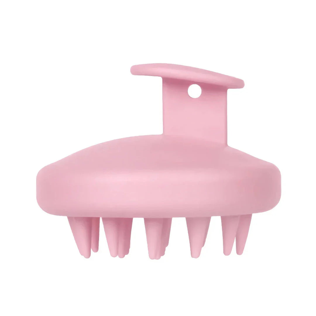 A green silicone scalp massager with soft bristles, designed to provide a soothing hair washing experience and promote healthy hair growth.
