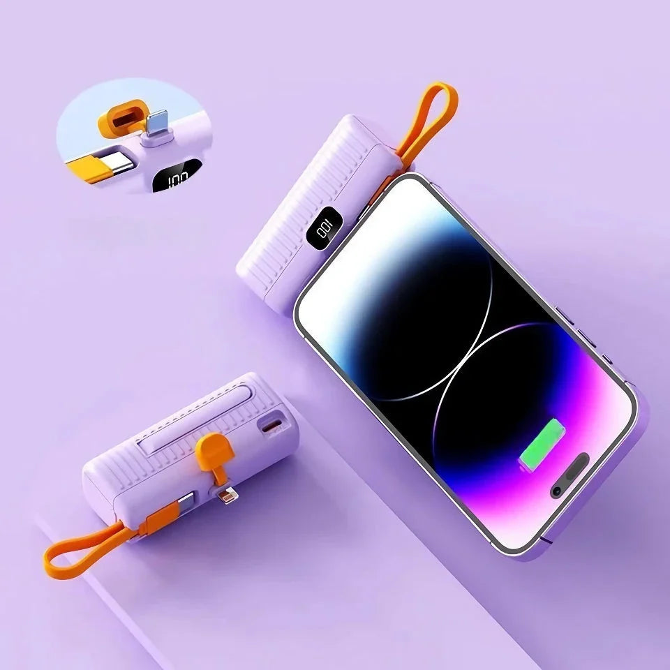 Compact, high-capacity power bank with dual charging ports and built-in cables for convenient, fast charging on the go
