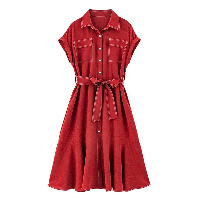 Elegant Hepburn-inspired fishtail shirt dress in blue, featuring a classic shirt design and flattering fishtail silhouette for a timeless British style.