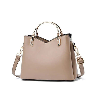Sophisticated navy blue PU leather bucket crossbody bag with elegant patchwork design and adjustable strap