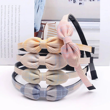Charming bow headband for girls, a stylish hair accessory made from high-quality canvas and rubber for a comfortable, secure fit
