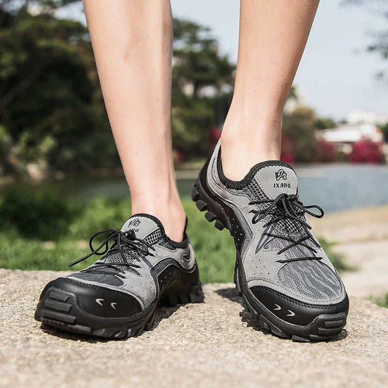 Couple wearing durable British-made mesh hiking shoes exploring the outdoors