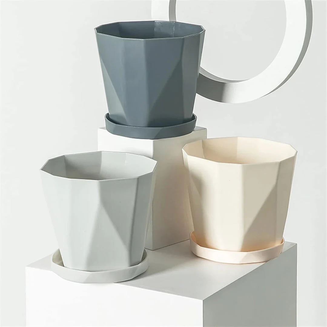Nordic-style resin flower pot in grey, featuring a minimalist design and suitable for indoor use in UK homes and offices