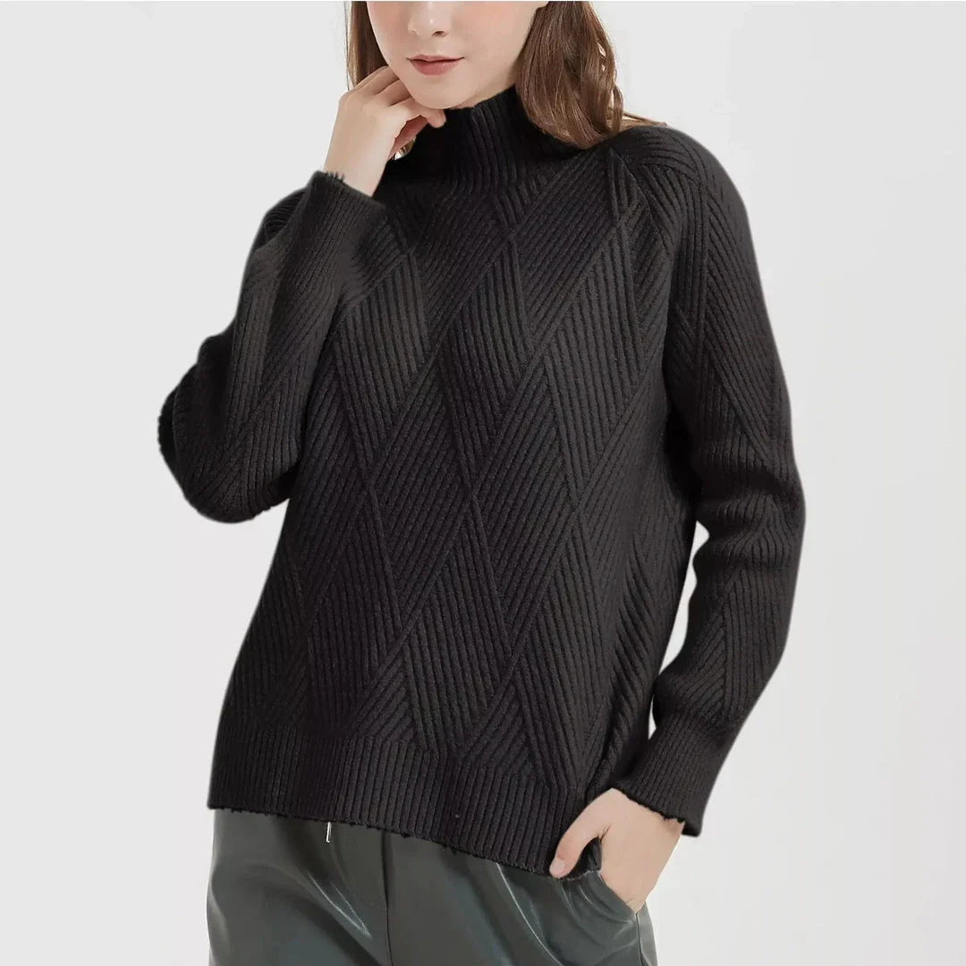 A cosy and stylish knitted turtleneck sweater in a classic beige colour, perfect for layering during the autumn and winter seasons.