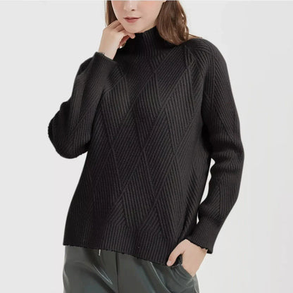 A cosy and stylish knitted turtleneck sweater in a classic beige colour, perfect for layering during the autumn and winter seasons.