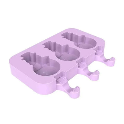 Purple silicone popsicle mould with stainless steel sticks, perfect for creating homemade frozen treats with a British flair